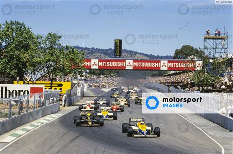 Nigel Mansell Williams FW10 Honda Leads Ayrton Senna Lotus 97T