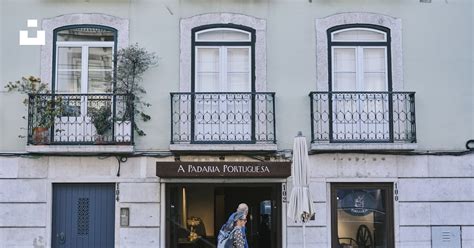 person walking    building photo  window image  unsplash