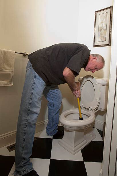 Plunging Toilet Stock Photos Pictures And Royalty Free Images Istock