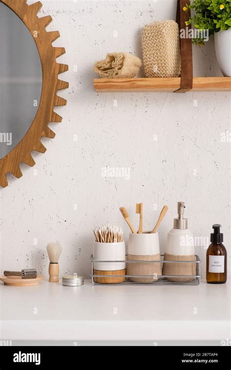 Bathroom With Eco Friendly Objects And Cosmetic Products On Shelves