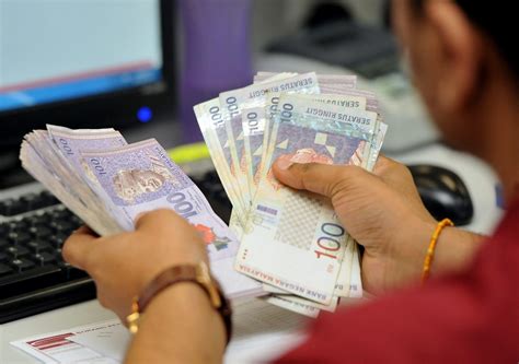 Ringgit Opens Marginally Lower Against US Dollar