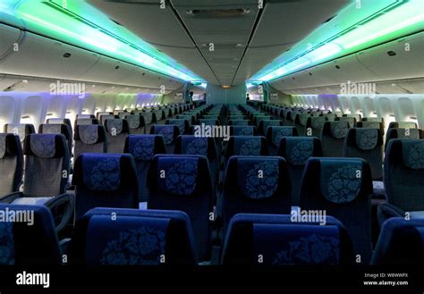 View of an economy-class cabin of a Boeing 777-300ER jet plane of China ...