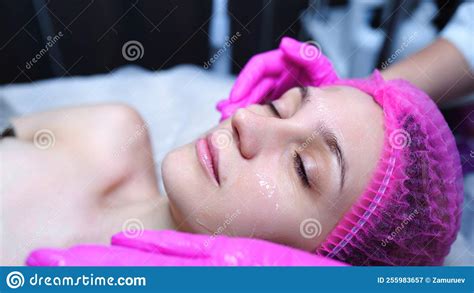 Attractive Female At Spa Health Club Getting A Facial Massage