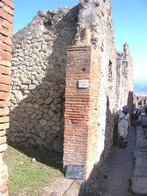 Vi Pompeii July Downpipe In Brick Door Pilaster On South