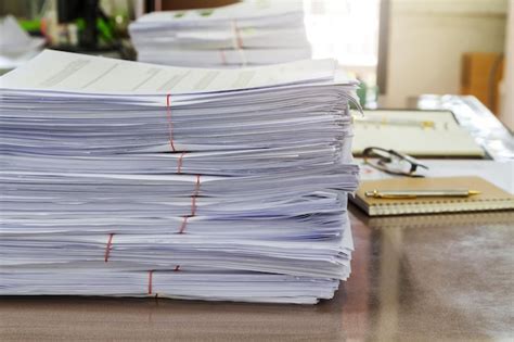 Premium Photo Close Up Of Papers On Table