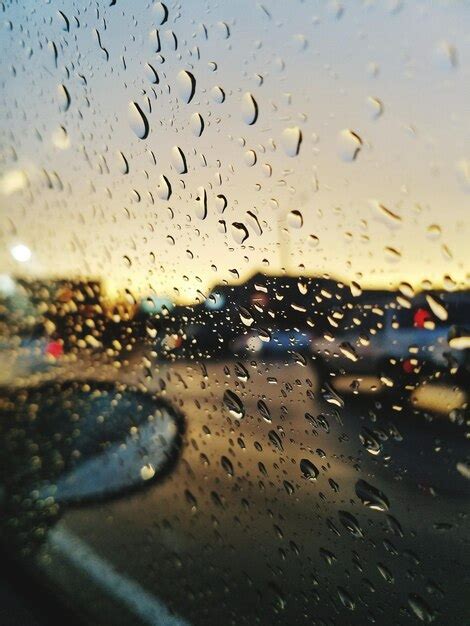 Premium Photo Raindrops On Glass Window