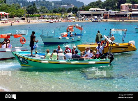 Tourists Leaving For A Tour Of The Caves Agios Spiridon Beach Agios