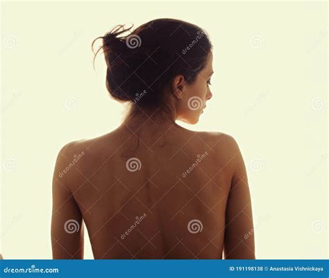 Beautiful Nude Woman Touching And Massaging The Shoulder With Healthy Tanned Skin Closeup