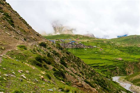 Green Terraced Fields And Traditional Architecture In The Ancient