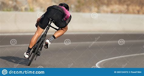 Road Bike Cyclist Man Cycling Athlete On A Race Bike Leaning Into A