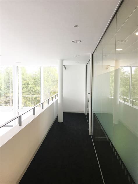 Glass Partitions At Niftylift Ltd Milton Keynes Buckinghamshire Mezzanine Glass Wall