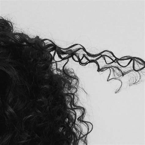 Black And White Photograph Of Long Curly Hair