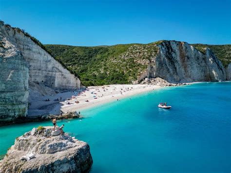 K Angle Shot Of Couple On A Rock At Fteri Beach Kefalonia