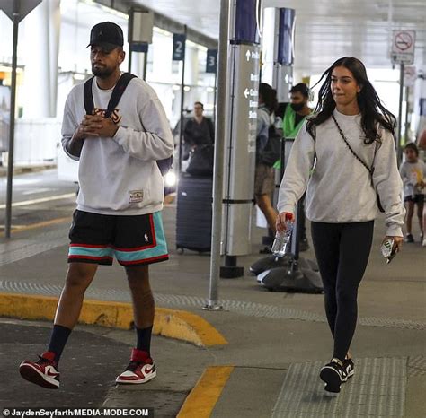 Nick Kyrgios Is Spotted Looking Glum As He Arrives Back In Sydney With