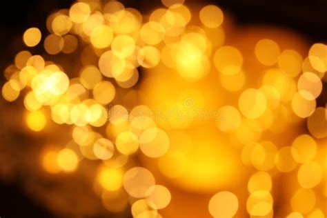 Gold Glitter With Bokeh Effect On Dark Stock Photo Image Of Golden