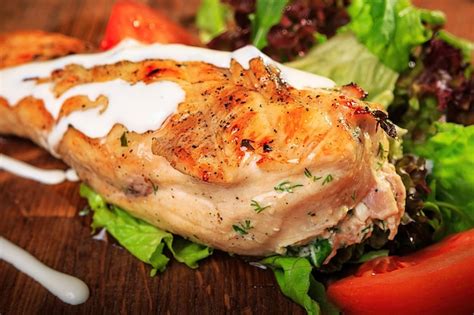 Premium Photo Chicken Fillet On A Wooden Board Grilled