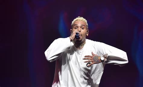 Chris Brown arrested in Manchester over alleged bottle attack that