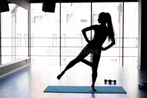 Woman During Her Fitness Workout At Gym With Rubber Resistance Band Resistance Band Exercises