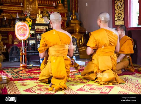 Thai monk in a temple Stock Photo - Alamy