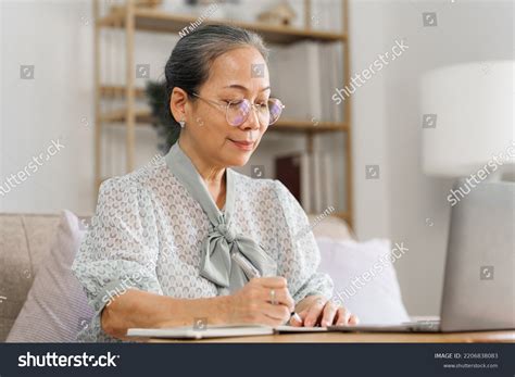 Happy Asian Mature Woman Remote Working Stock Photo Shutterstock