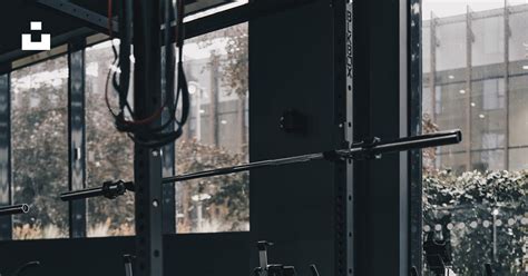 A gym with a row of exercise equipment photo – Free Gym Image on Unsplash