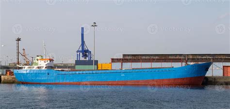 Cargo Ship in port 11551666 Stock Photo at Vecteezy