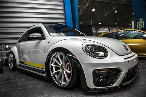 Customized to Impress: White Volkswagen Beetle Dressed in Aftermarket ...