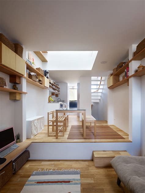 Skylights And Slatted Floors Bring Light Into 25 Metre Wide House In Japan