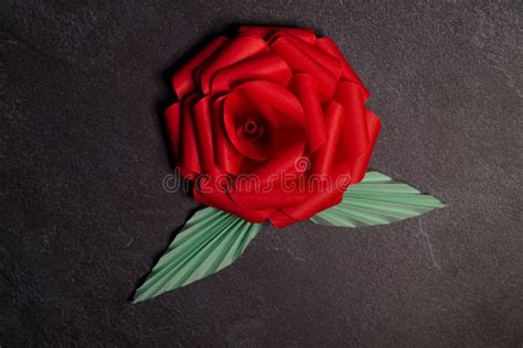 Red Origami Rose Blossom - Paper Art on Textured Background Stock Photo ...