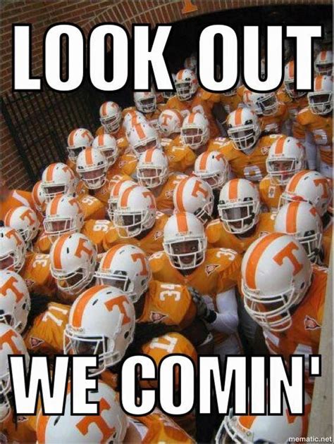 An Orange And White Football Team With The Words Look Out We Comin