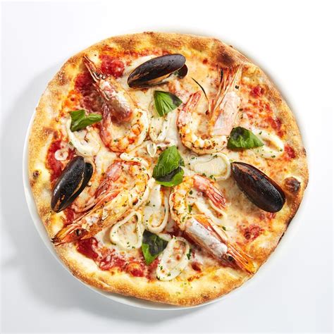 Italian Seafood Pizza With Squid Mussels And Shrimps Stock Photo