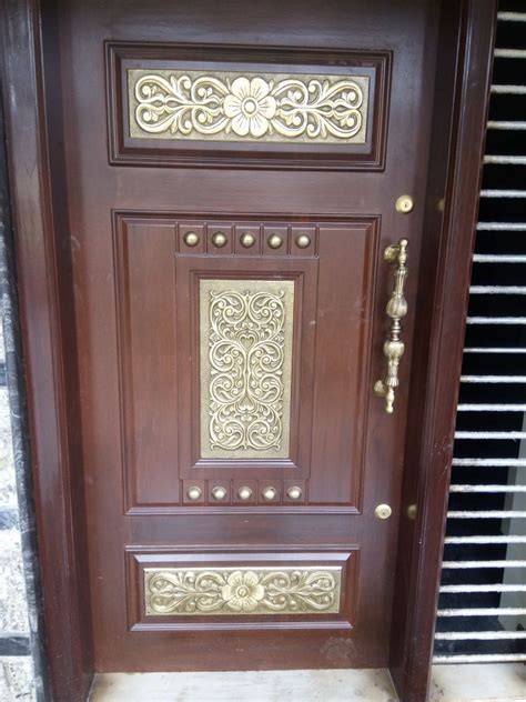 Elegant Wooden Door With Decorative Designs