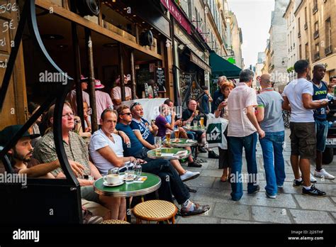 Paris France View Large Crowd People French Bistro Restaurant Cafe Terrace Outside Gay Bar