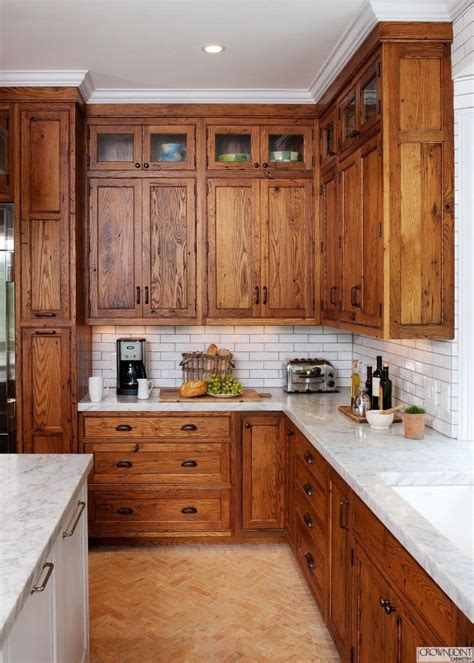 Dark Oak Cabinets With White Quartz Countertops | www.resnooze.com