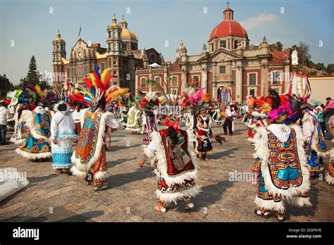 Indigenous Dancers In Traditional Costumes During The Virgen De