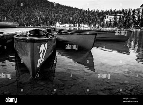 Canoes On Lake Louise In Banff National Park Alberta Canada Stock