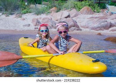 Little Cute Girls Enjoying Kayaking On Stock Photo (Edit Now) 219238222