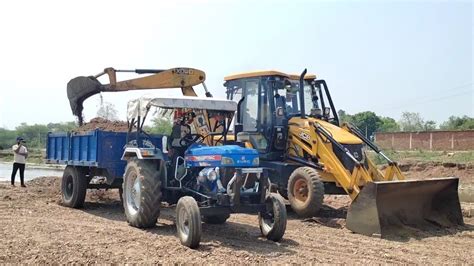 New Jcb Dx Machine Loading Mud In Powertrack Tractor Jcb Loading