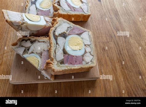 A Delectable Portion Of Chicken Ham And Egg Pie Showcasing The