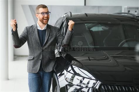 Happy Owner Of A New Car Emotional Handsome Man In Casual Clothes Is