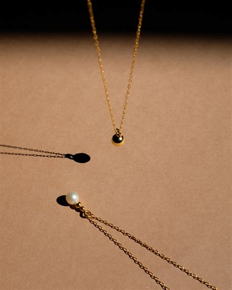 GOLD BALL NECKLACE METAFORMI