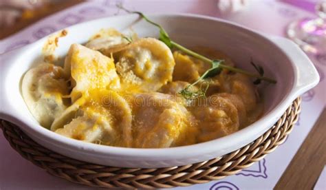 Delicious Dumplings With Chicken And Ground Beef Baked With Cheese