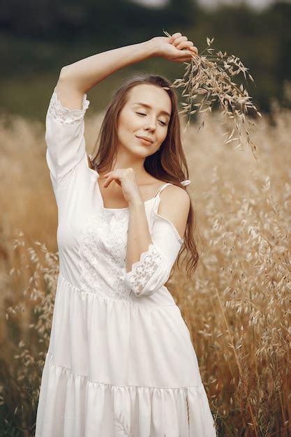 Free Photo Woman In A Summer Field Brunette In A White Dress