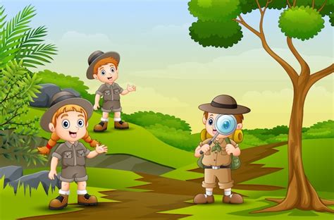 Niños felices explorando en la naturaleza Vector Premium