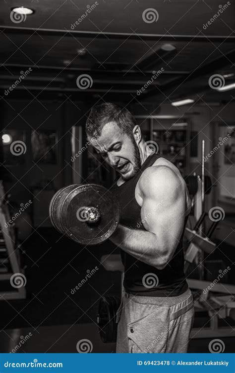 Professional Athlete Performs Exercises In The Gym Stock Photo Image