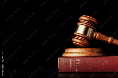 Judge Gavel With Holy Bible On Black Background Stock Photo Adobe Stock