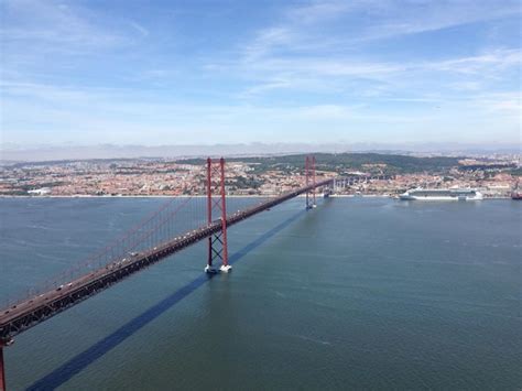 Premium Photo 25 De Abril Bridge Over Tejo River Against Sky