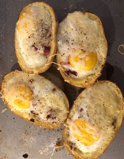 Baked Eggs In Potatoes With Bacon Baked Potatoes Lined With Bacon And Egg And Baked With Ch