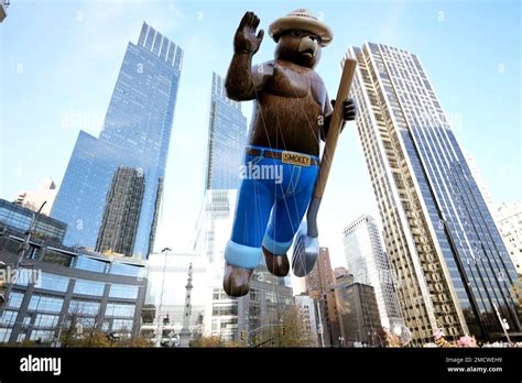 The Smokey Bear Balloon Floats In The Macys Thanksgiving Day Parade On