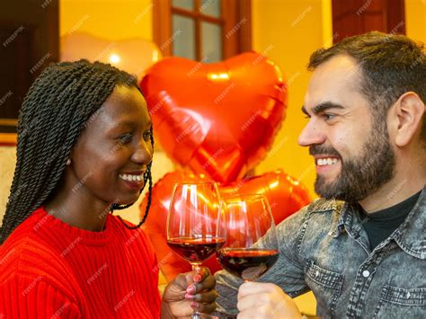 Premium Photo Portrait Of An Interracial Couple Looking At Each Other